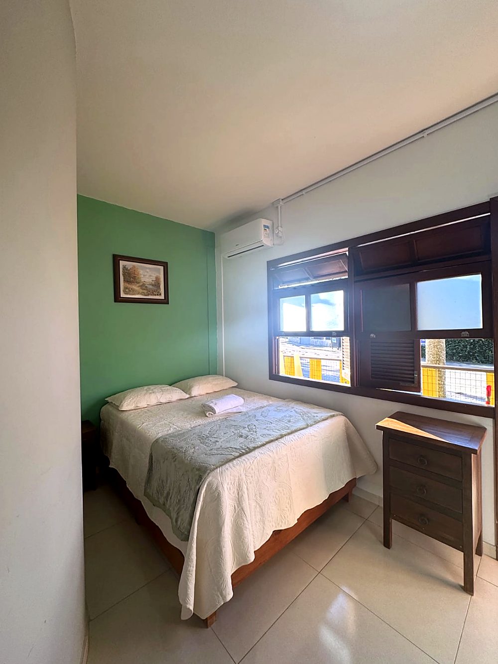 Cama de casal da Suíte da Pousada Capricórnio